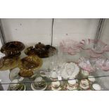 A quantity of decorative glassware to include a smoky brown dressing table set etc.