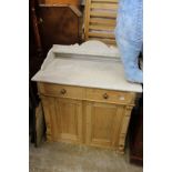 A Victorian marble top pine washstand.