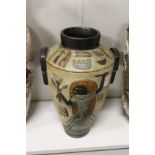 An Egyptian revival pottery vase.