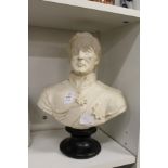 A moulded bust of a military figure.