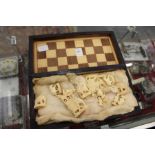 A boxed chess set.