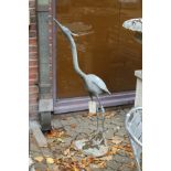 A good lead model of a standing heron.