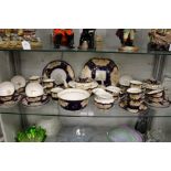 A large quantity of 19th century tea ware, possibly by Rockingham, to include teapot, sucrier,