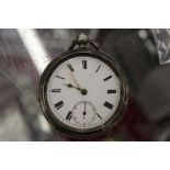 A silver pocket watch.