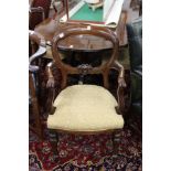 A set of six 19th century mahogany dining chairs with carved cresting rails and tie bars with