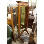 A good oak cheval mirror with folding side mirrors.