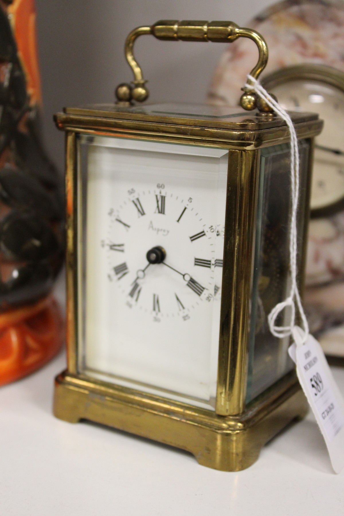 An Asprey of London brass carriage clock.