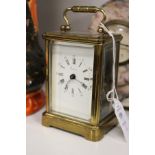 An Asprey of London brass carriage clock.