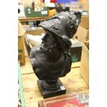 A cast metal classical male bust.