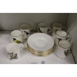 A set of six Hammersley china coffee cups and saucers decorated by Roland Ward with various birds,