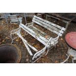 A pair of cast iron and wooden slatted garden benches (AF).