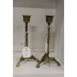 A good small pair of brass candlesticks on hoof feet.