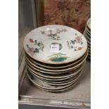 Ten Chinese floral decorated saucer dishes.