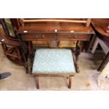 A reproduction sofa table and a stool.