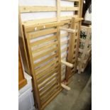 A modern light oak bedframe.