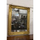 An early gilt framed mirror.