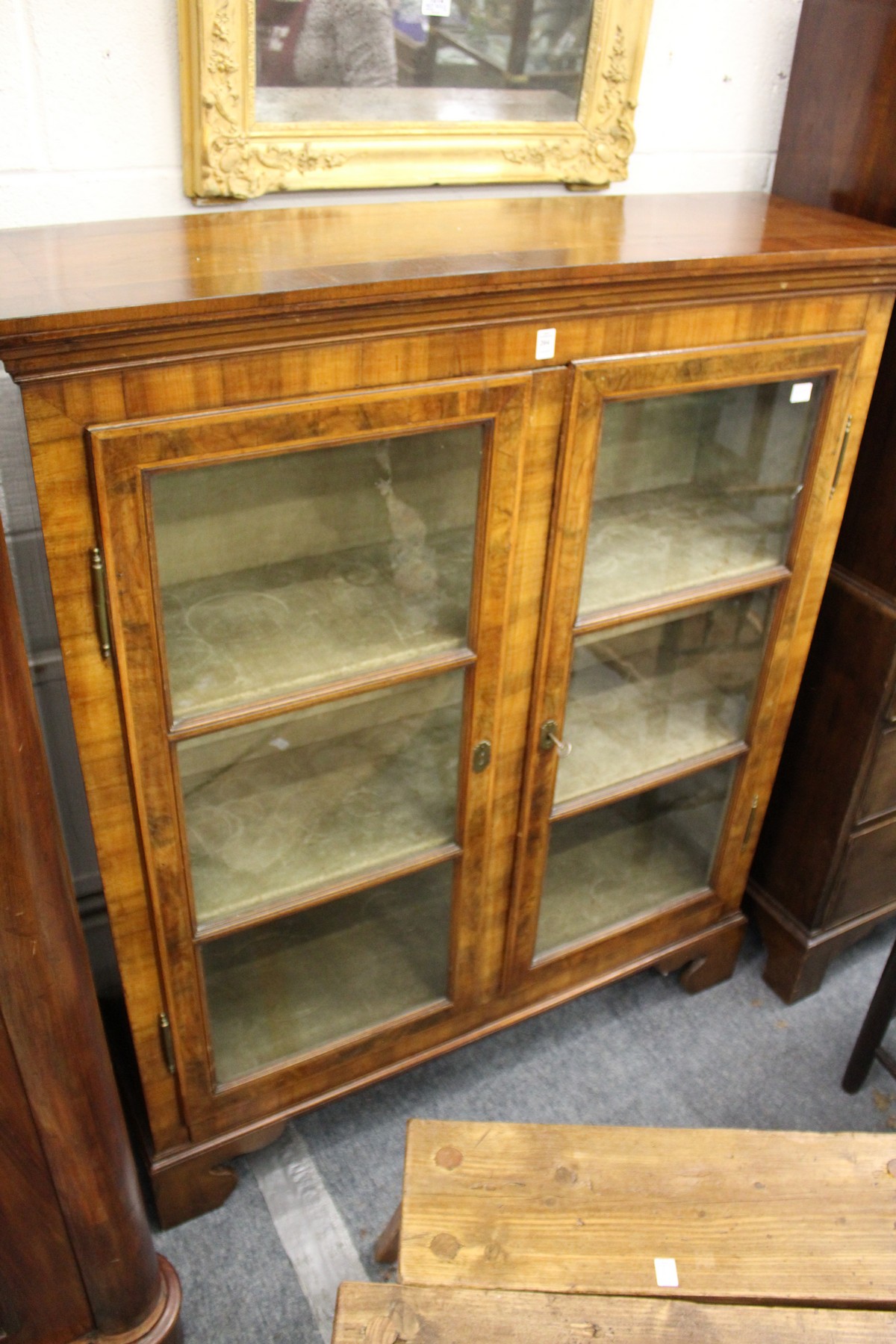 A Victorian walnut two door bookcase.