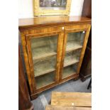 A Victorian walnut two door bookcase.