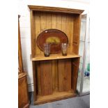 A pitch pine free standing two tier bookcase with adjustable shelves.