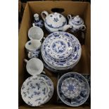 A quantity of blue and white china.