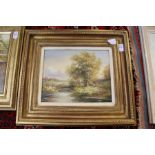 Rural River Landscape with Figure on a Path oil on board, in a decorative gilt frame.
