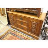 A late Victorian oak sideboard.