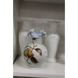 An opaque glass vase with painted decoration and a pair of glass vases.