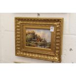 River Landscape oil on board, in a decorative gilt frame.