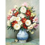 Marcel Dyf (1899-1985) French, a still life of colourful mixed flowers in a blue and white vase, oil