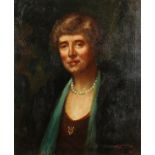 P. Tennyson, a bust length portrait of a lady, oil on canvas, signed and indistinctly dated, 24" x