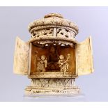 A GOOD QUALITY EARLIER 19TH CENTURY CARVED IVORY IMMORTAL SHRINE, carved in relief to depict