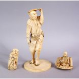 A MIXED LOT OF 3 JAPANESE MEIJI PERIOD CARVED IVORY OKIMONO, one larger okimono of a man with his