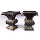 A LARGE & HEAVY PAIR OF JAPANESE BRONZE RELIEF DRAGON VASES, carved in relief with dragons and