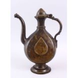 A 17TH CENTURY MUGHAL INDIAN BRONZE EWER, 30cm high x 21cm.