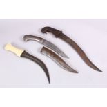 A COLLECTION OF 3 INDO PERSIAN DAGGERS - one with a bone handle, one with a white metal handles
