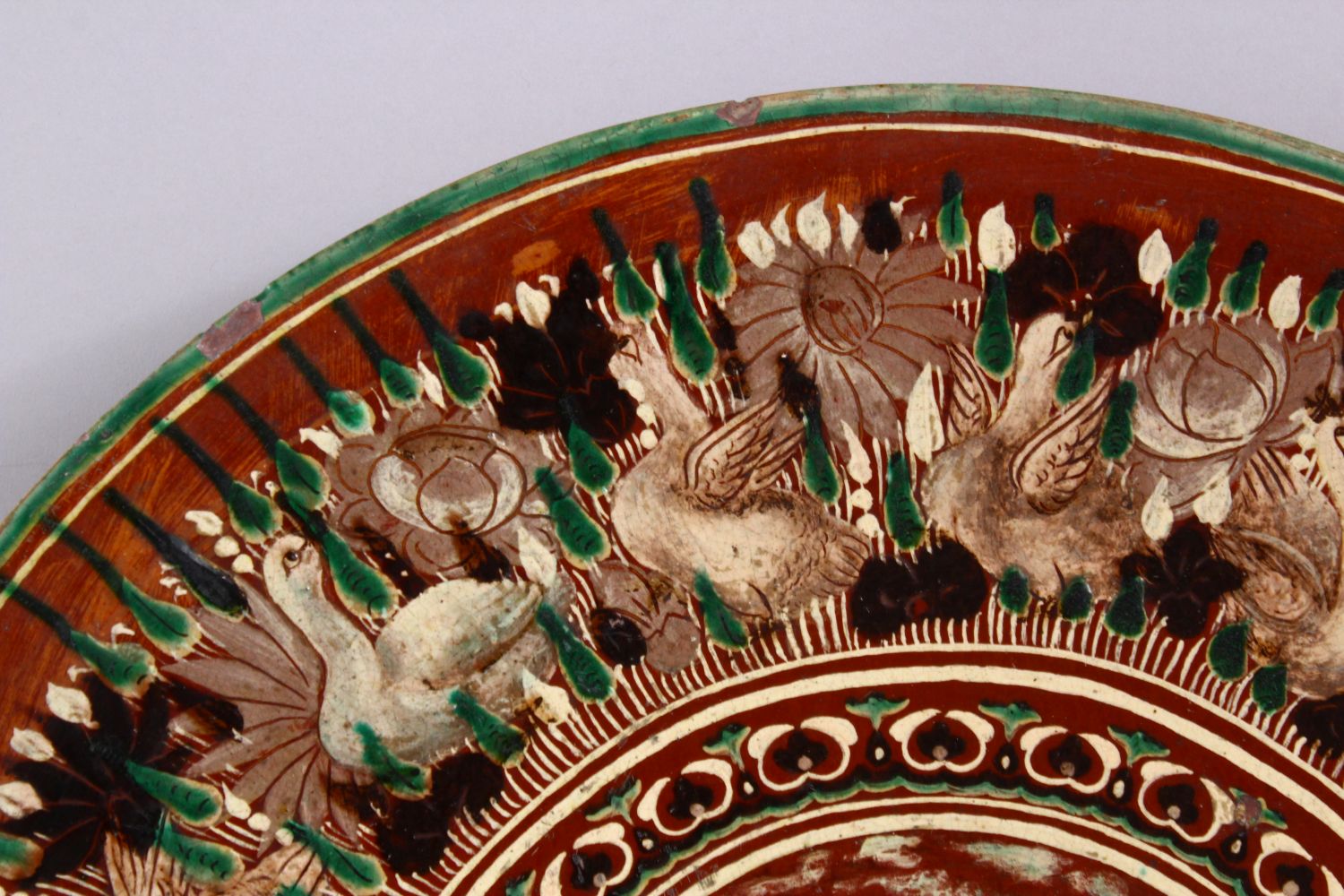 A 19TH CENTURY OR EARLIER INDIAN POTTERY DISH, with poly chrome decoration depicting a multi - Image 3 of 5