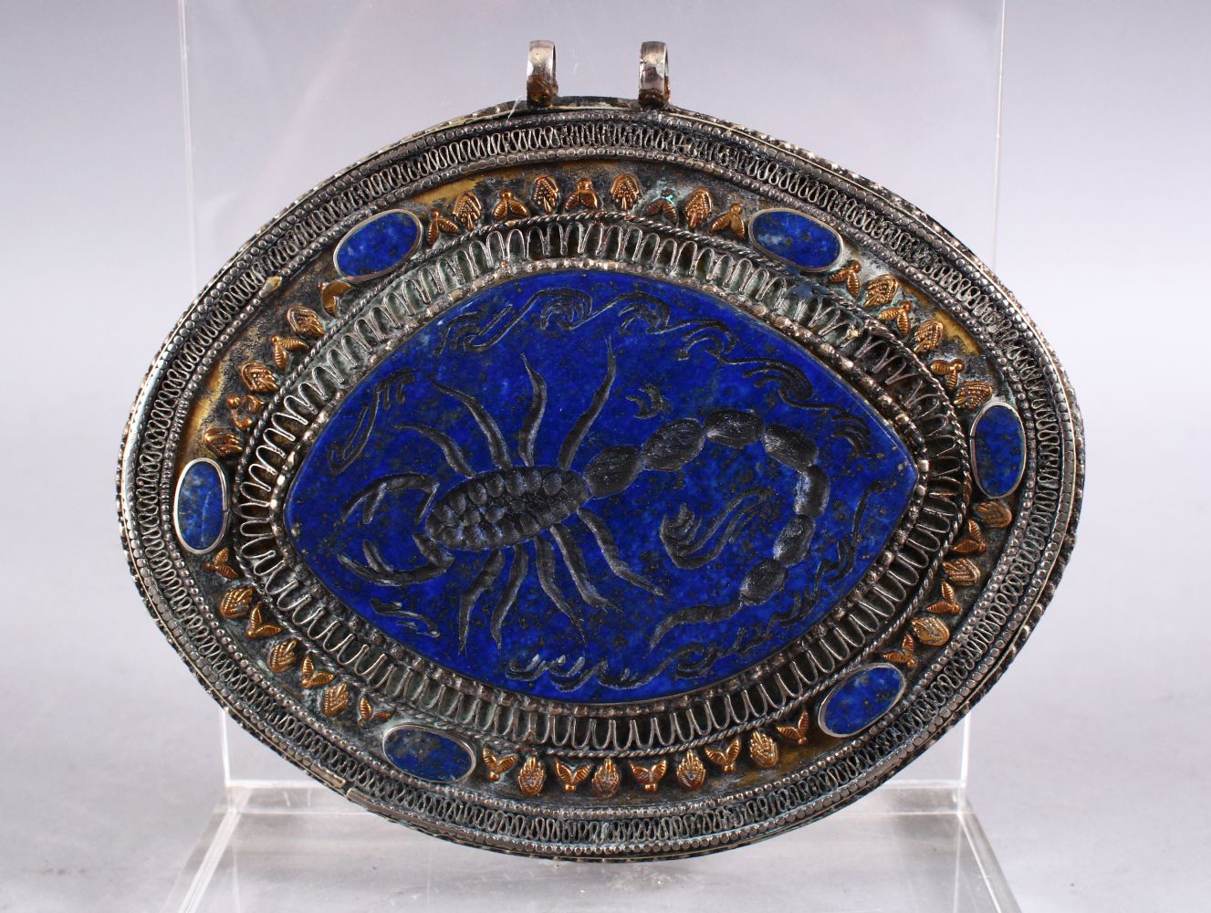 A GOOD ISLAMIC LAPIS LAZULI & WHITE METAL SEAL OF A SCORPION, The stone carved seal inset in to a