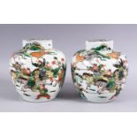 A GOOD PAIR OF 18TH / 19TH CENTURY CHINESE FAMILLE VERTE PORCELAIN WARRIOR GINGER JARS & COVERS,
