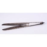 AN 18TH CENTURY THAI SILVER INLAID STEEL CEREMONIAL SCISSORS, with silver inlay floral decoration,