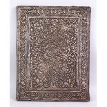 A LARGE 19TH CENTURY PERSIAN QAJAR REPOSÉ SILVER PANEL, with scenes of birds amongst formal floral
