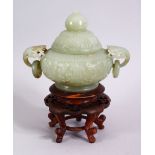 A CHINESE CARVED CELADON JADE TWIN HANDLE CENSER & HARDWOOD STAND, the censer carved with floral