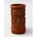 A GOOD 19TH CENTURY CHINESE CARVED BAMBOO BRUSH POT, carved in deep relief to depict immortals