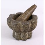 AN EARLY ISLAMIC POSSIBLY ANDALUSIAN HISPANO MORESQUE STONE PESTLE AND MORTAR, mortar: 8.5cm 11.