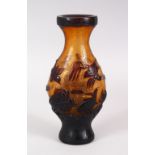 A CHINESE PEKING AMBER GLASS OVERLAID VASE, with birds carp and lotus, base with a seal mark, 17cm.
