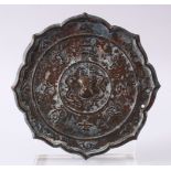 A GOOD 19TH CENTURY OR EARLIER CHINESE BRONZE TANG STYLE MIRROR, with archaic calligraphy and