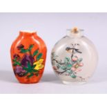 TWO 19TH / 20TH CENTURY CHINESE SNUFF BOTTLES, one porcelain with coral ground and decoration of