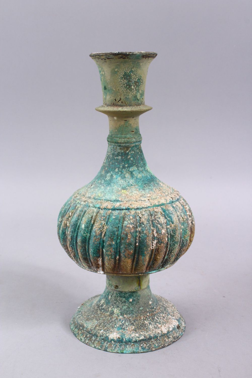 A GOOD EARLY ISLAMIC BRONZE HUQQA BASE, with facet body and verdigris27cm., - Image 3 of 3