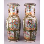 A GOOD LARGE PAIR OF 19TH CENTURY CHINESE CANTON FAMILLE ROSE PORCELAIN VASES, decorated with panels