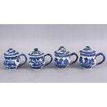 FOUR 18TH CENTURY CHINESE BLUE & WHITE PORCELAIN CUDDLE CUPS & COVERS, each decorated with views