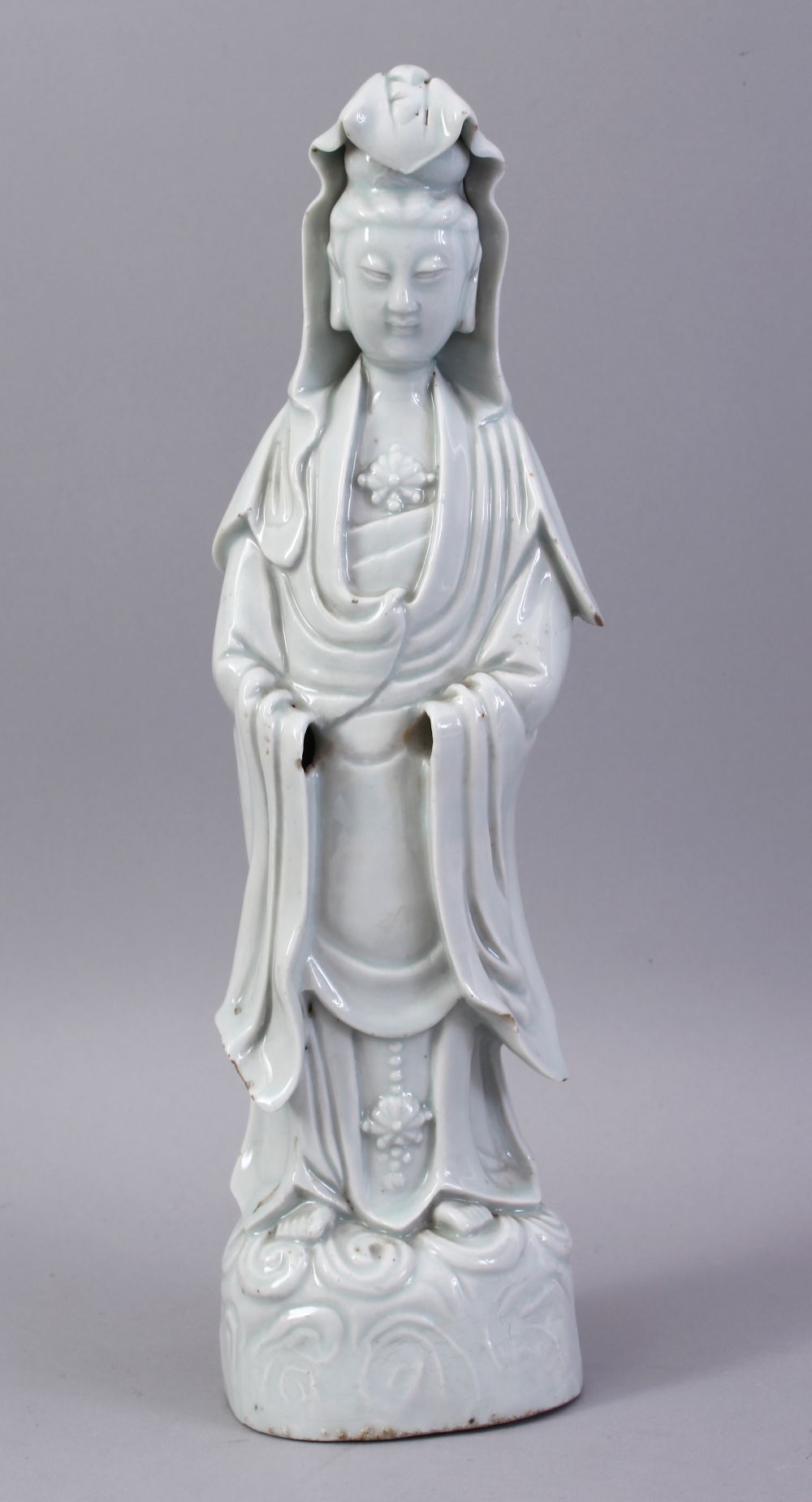 A GOOD 19TH CENTURY CHINESE BLANC DE CHINE PORCELAIN FIGURE OF GUANYIN, 35cm high.